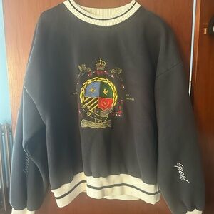 Blue Sweater with Embroidered Crest